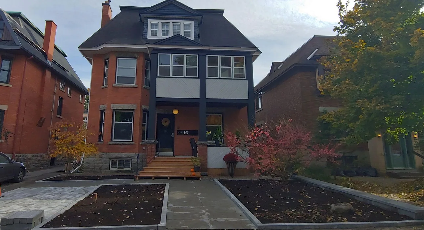 Front property landscaping with interlock walkway